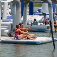 MarineWarehouse/Aqua-Glide-Solarium-Connected-To-Lounges-People-Sunbathing__77720.1739477096