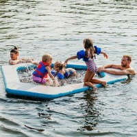 MarineWarehouse/Family-enjoying-Mission-Reef-Lite-Splash-Inflatable-Water-Mat__34588.1739477082