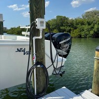 MarineWarehouse/Flushmaster-4-Outlet-Automated-Outboard-Flushing-System-hooked-up-to-Mercury-Outboard__82043.1739477313