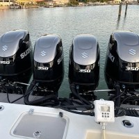 MarineWarehouse/Flushmaster-4-Outlet-Automated-Outboard-Flushing-System-hooked-up-to-four-Suzuki-Outboards__73362.1739477314