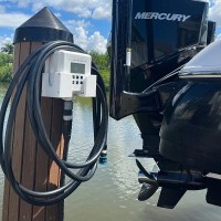 MarineWarehouse/Flushmaster-Cradle-SM-FMCRDL1-installed-in-a-dock-with-a-Mercury-Outboard__77874.1739477316