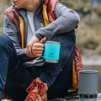 MarineWarehouse/Man-holding-a-Dometic-16oz-laguna-mug__44942.1739477376