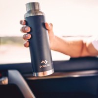 MarineWarehouse/Man-holding-a-Dometic-22oz-bottle__61312.1739477375