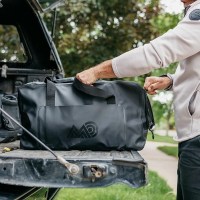 MarineWarehouse/Man-loading-a-Mission-CASSI-58L-Duffel-Tote-in-a-truck-bed__71782.1739477273