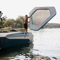 MarineWarehouse/Man-throwing-Mission-Reef-Lite-Splash-Inflatable-Water-Mat-into-water__58357.1739477081