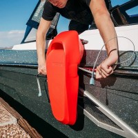 MarineWarehouse/Mission-Sentry-2.0-Race-Red-Boat-Fender-man-adjusting-drylock-straps__39217.1754572040