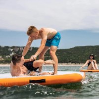 MarineWarehouse/Two-men-playing-on-a-Mission-REEF-85-Inflatable-Water-Mat__11779.1739477305
